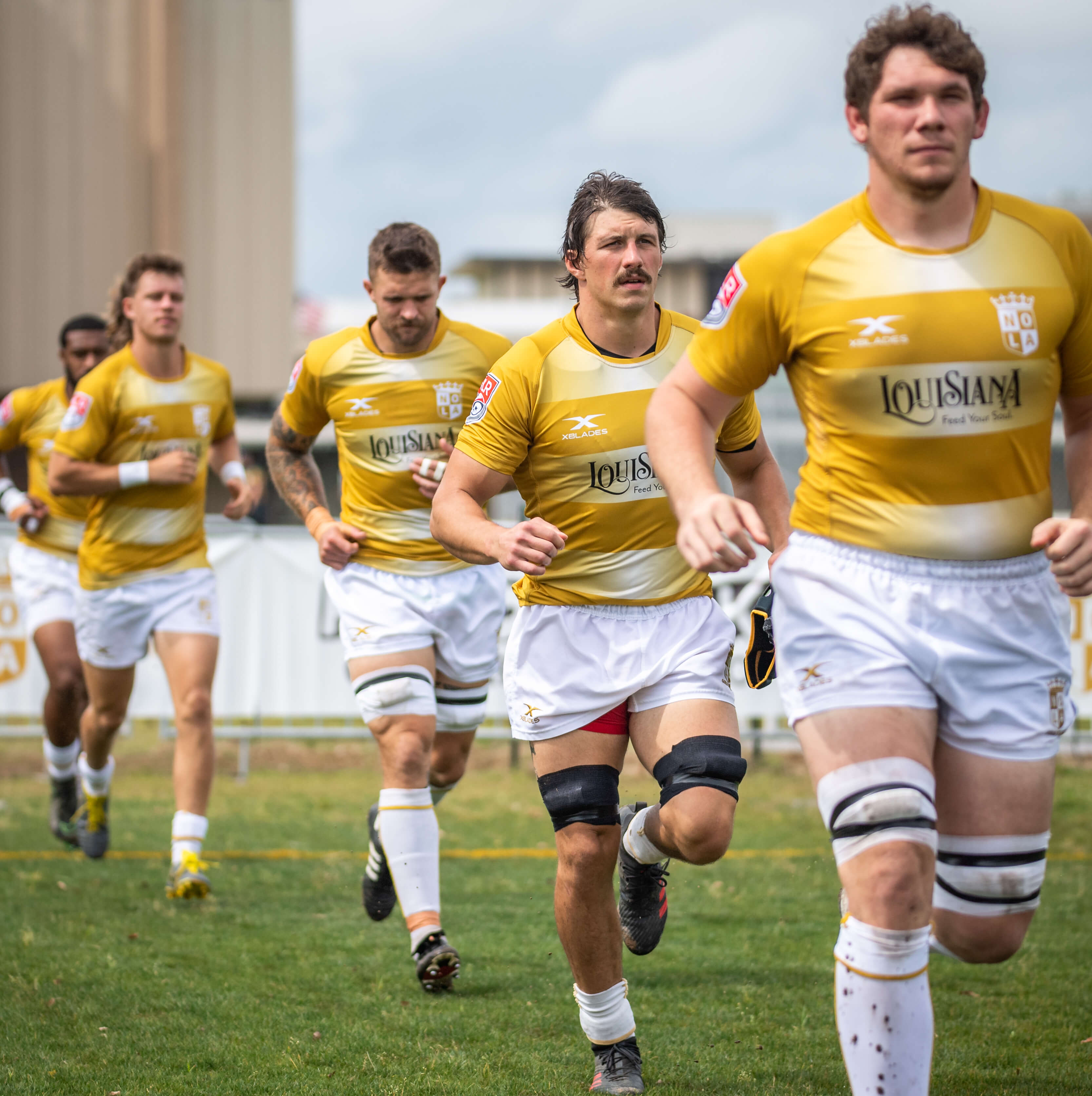 nola gold rugby jersey